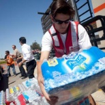 Red Cross volunteers unload supplies during the Texas wildfires.