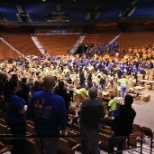 Dunkin' Brand employees coming together to fill boxes for local food bank.