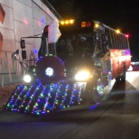 Bus decorated as a train for a holiday parade