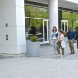 Employees at GPC HQ stroll across the corporate campus from the 3100 building to the 2999 building.