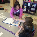 BHS student reading in Iñupiaq to Ipalook students.