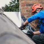 Chimney Repair Technician performing Flashing Installation on a customers rooftop.