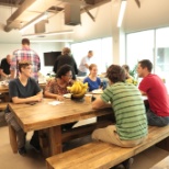 Team members enjoying one of our catered lunches in the kitchen!