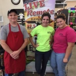 This photo captured of myself and two other employees being featured on our home radio station.