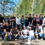 Our team planting new greenery in a nature reserve park