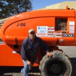 Master painter  Charles Key working his magic on a 1998 JLG man lift. J-86