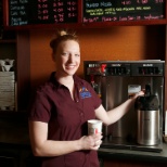 Cafe Baristas are happy to serve you up a java.