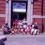 Kids in front of building