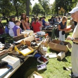 Helping our communities, Jim Wellehan hands out gently used footwear in a Lewiston Park