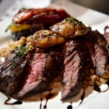 Wood Grilled Hanger Steak with Vegetable Stack, House Risotto and Roasted Cippolini Onions