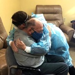 Simple hug becomes powerful embrace during reunion