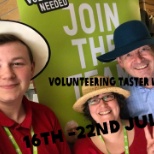 3 happy volunteers