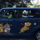 Cody and Josie showing off a Doggy Dates car.