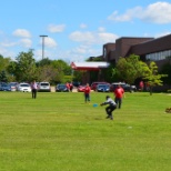 Playing frisbee outside of headquarters