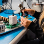 Electrical Assembly Technician building a stage