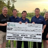 Charity check presentation at the 2019 TSC Golf Classic