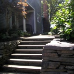 redesigned drive entry and stone steps,wall