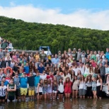 Annual staff photo taken by our own private camp lake!