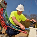 Taplin employee working on equipment