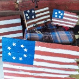 We are proud to Americans...Our Participants made these flags out of donated barn wood!