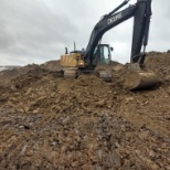 Digging a retaining pond out.