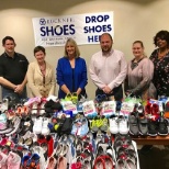 Leadership Team donating shoes to Buckner International.