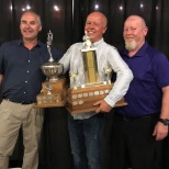 Jimmy - unit # 60 celebrates being named best truck driver in Ontario with his managers.