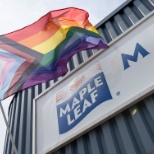 Pride flag and Maple Leaf sign at Guelph - Speedvale plant