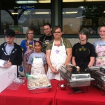 myself and fellow members working to pass out food at a local store.