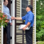 One of our technicians introducing themselves to a customer