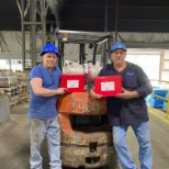 Employees with July 4th Gift Boxes