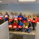 Employees with July 4th Gift Boxes