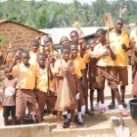 Students doing general cleaning in the community.