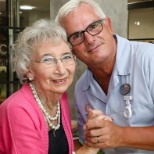 Resident and staff member dancing