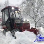 Ventrac sidewalk machine