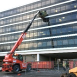 This soon to be residential building is tended to with our Manitou MRT 2550 rotating telehandler.