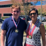 PMIC enjoying a Cornhole tournament on a beautiful summer day!