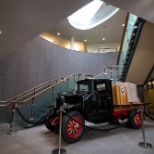 Antique truck sitting in the lobby of the Anderson Trucking Service (ATS) headquarters