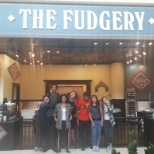 Taking photos with our co-workers at The Fudgery front