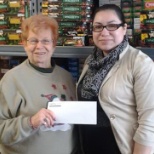 Elkhorn's Branch Manger giving their 2013 Donation to Elkhorn Food Pantry