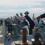 Lowering a Catapult into the flight deck