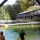 Kids taking swimming class.