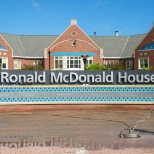 A member of our Dream Team cleaning the concrete at Cleveland's Ronald McDonald House