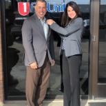 Randy Wilson getting his First United Bank pin from Toni Preston!