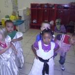 enjoying dancing in their dress up clothes