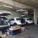 Tampa Police Ford Explorers getting equipped.