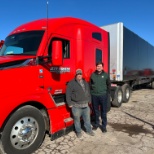 One of our drivers and dispatchers getting ready to take our new Conestoga trailer out on the road!