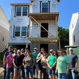 staff volunteer at a habitat build day