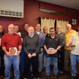 Employees getting their plaque for working 20+ years