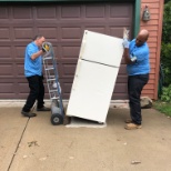 One of our great teams removing an appliance from a customers home